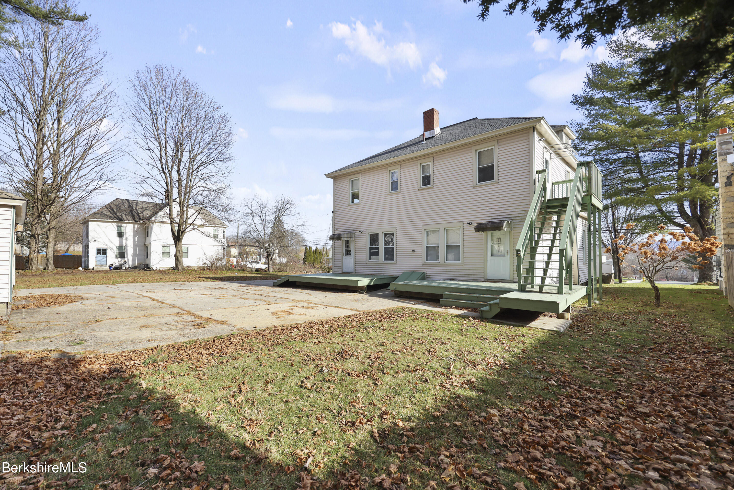 105-107 Onota Street Pittsfield, MA 01201 - Photo 41 of 46 a view of a house with snow on the road