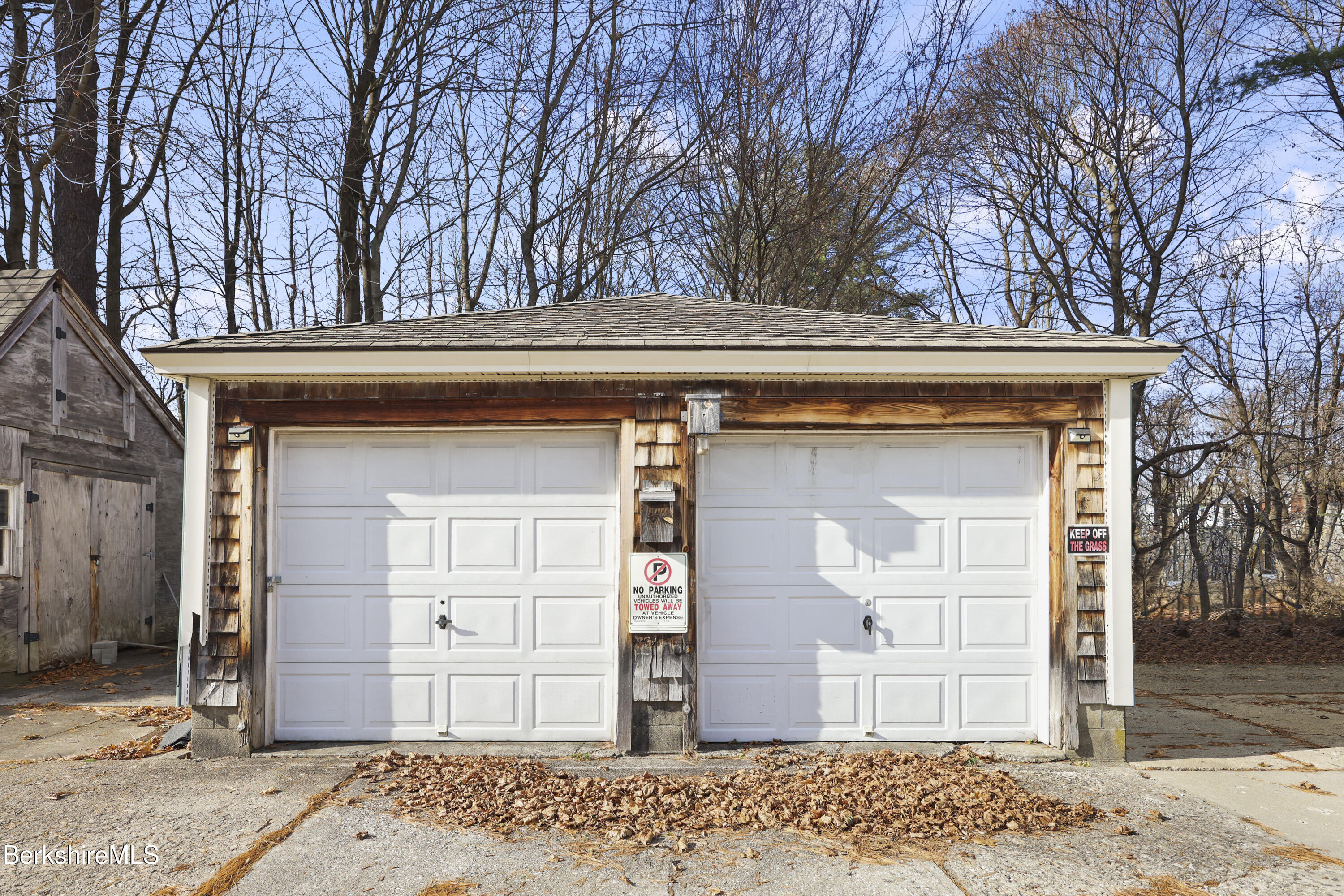 105-107 Onota Street Pittsfield, MA 01201 - Photo 42 of 46 a view of a wooden door of the house