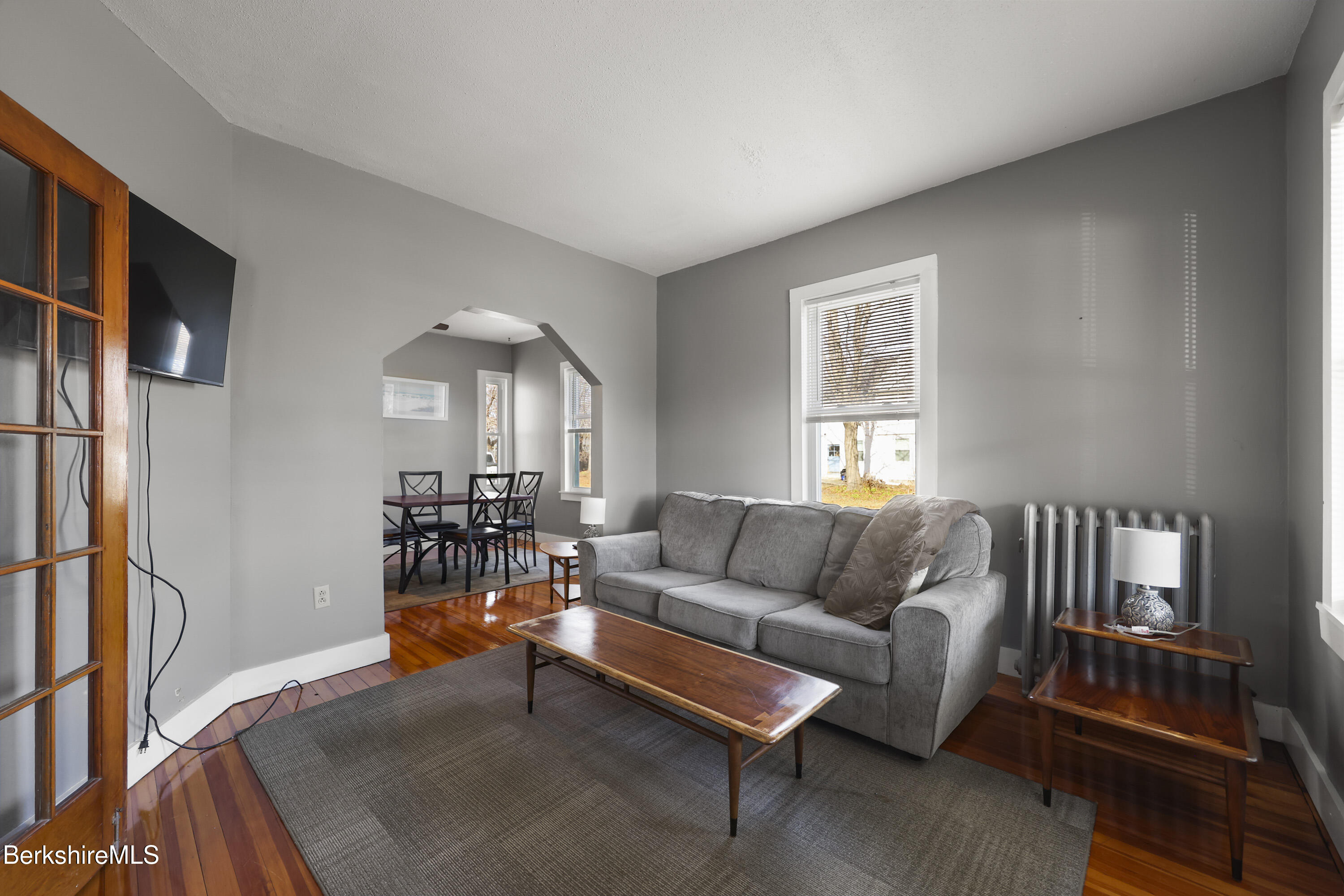 105-107 Onota Street Pittsfield, MA 01201 - Photo 5 of 46 a living room with furniture and a window