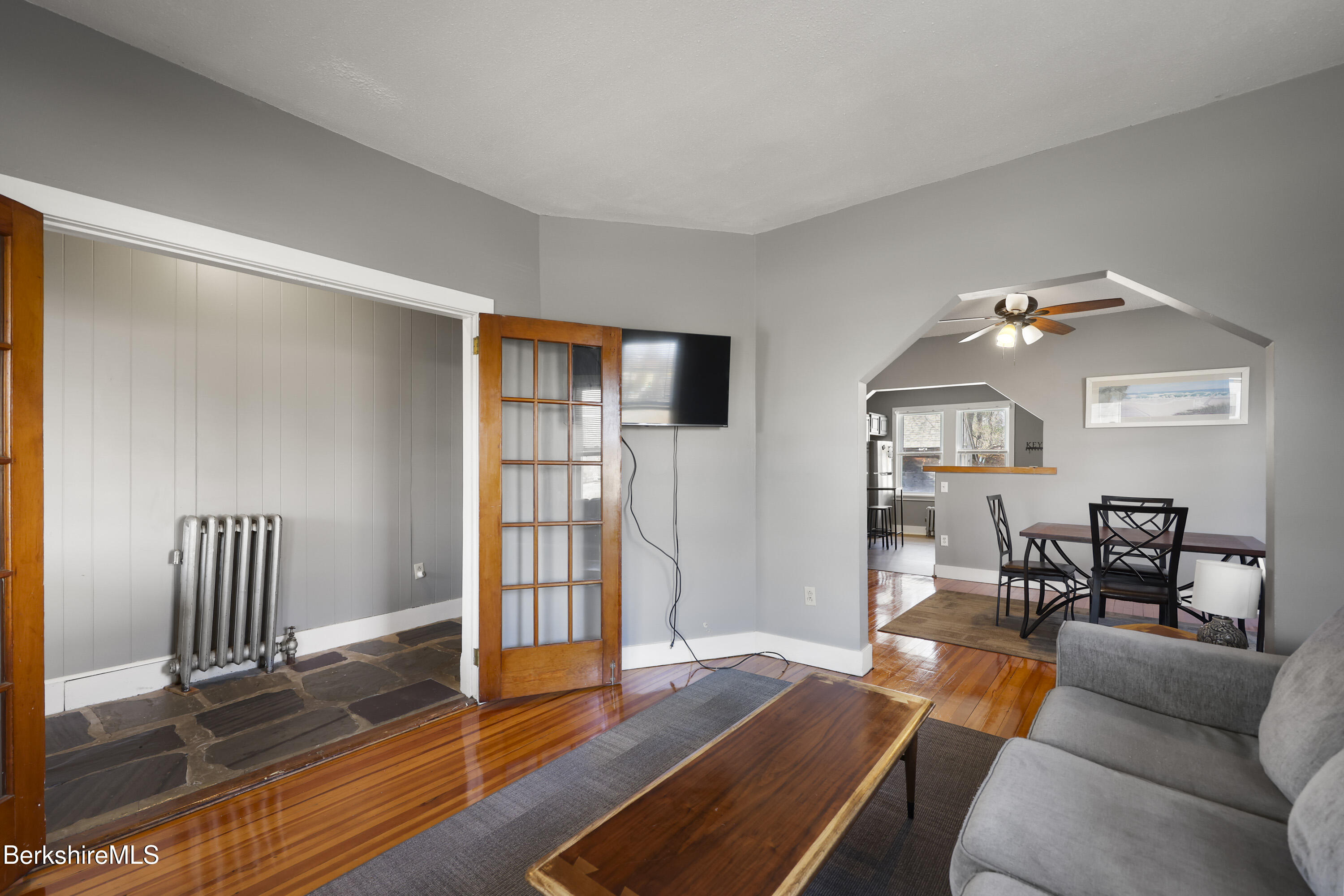 105-107 Onota Street Pittsfield, MA 01201 - Photo 6 of 46 a living room with furniture and wooden floor