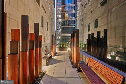 a outdoor space with patio couches and pool table