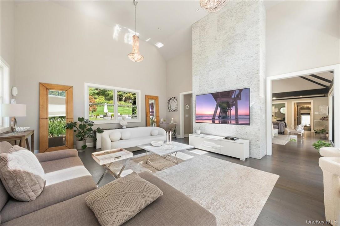 1570 Journeys End Road Croton-on-Hudson, NY 10520 - Photo 11 of 50 a living room with furniture and a large window