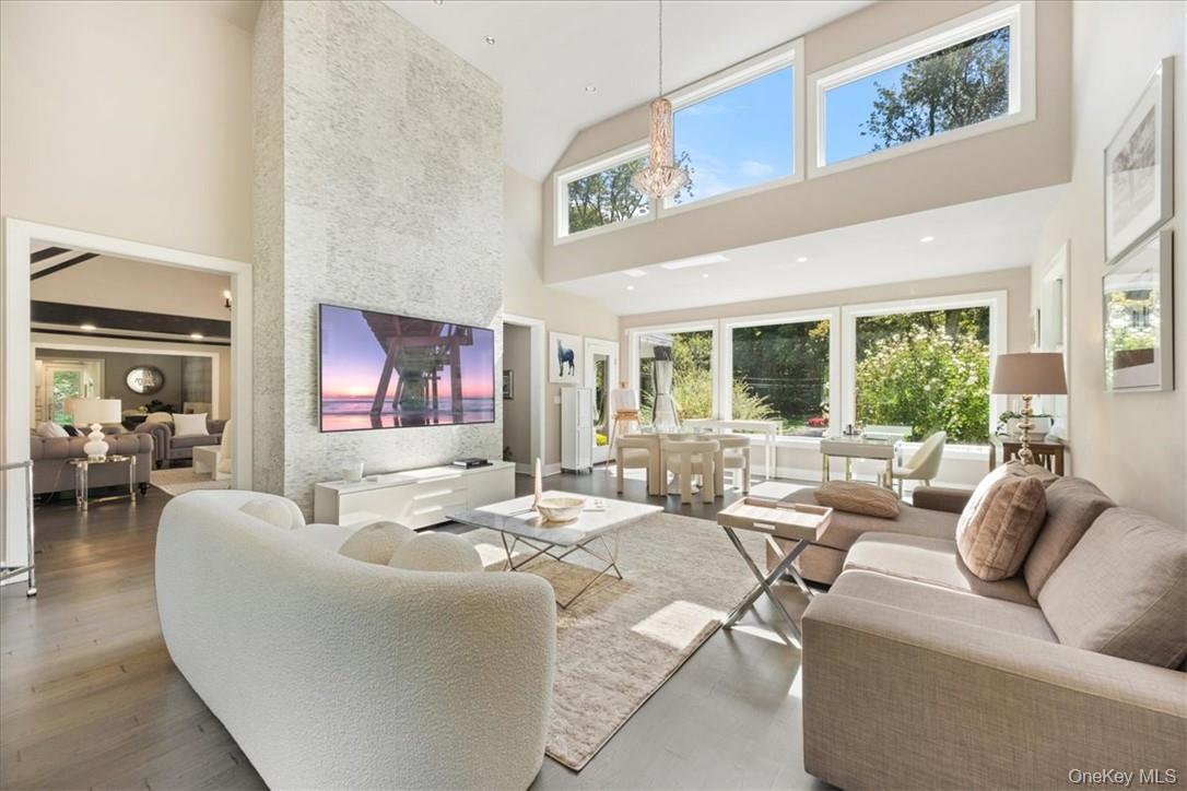 1570 Journeys End Road Croton-on-Hudson, NY 10520 - Photo 12 of 50 a living room with furniture and a large window