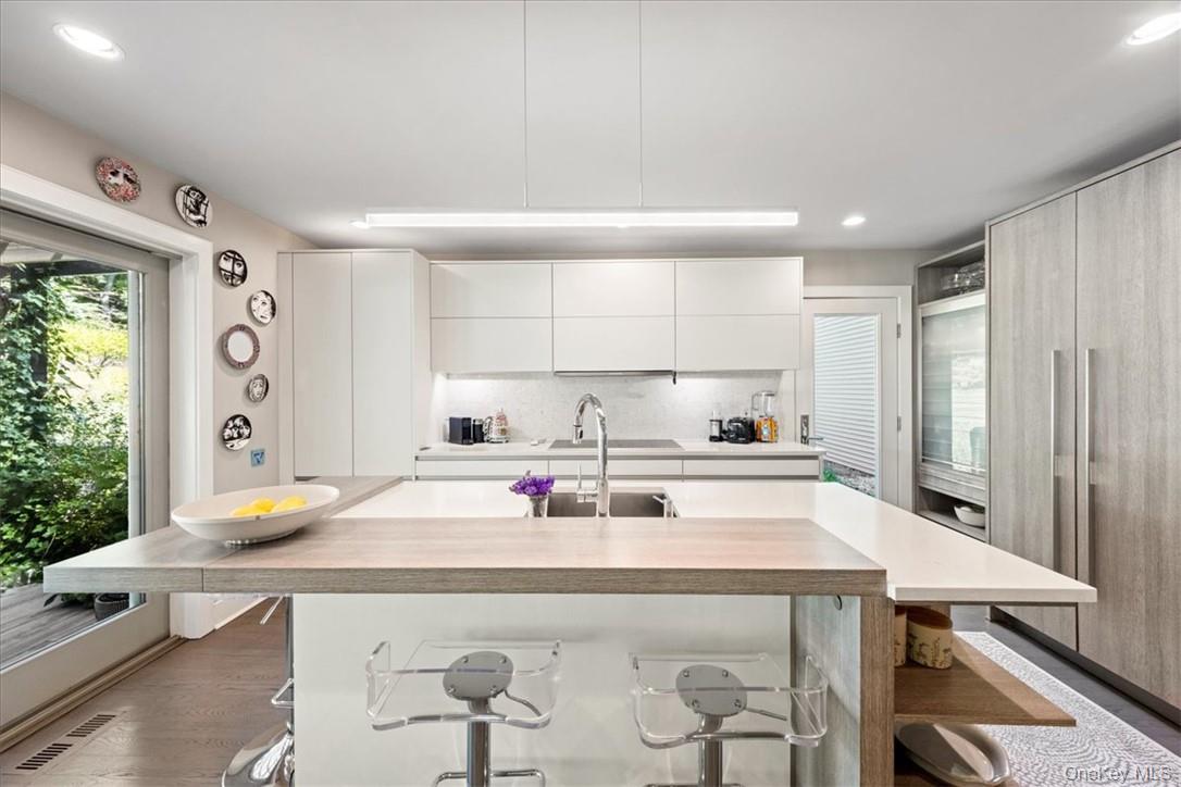 1570 Journeys End Road Croton-on-Hudson, NY 10520 - Photo 18 of 50 a kitchen with kitchen island stainless steel appliances a sink and cabinets