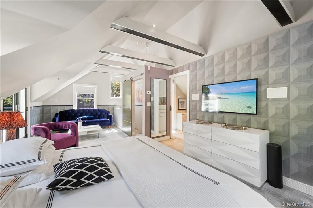 1570 Journeys End Road Croton-on-Hudson, NY 10520 - Photo 21 of 50 a living room with furniture and a flat screen tv