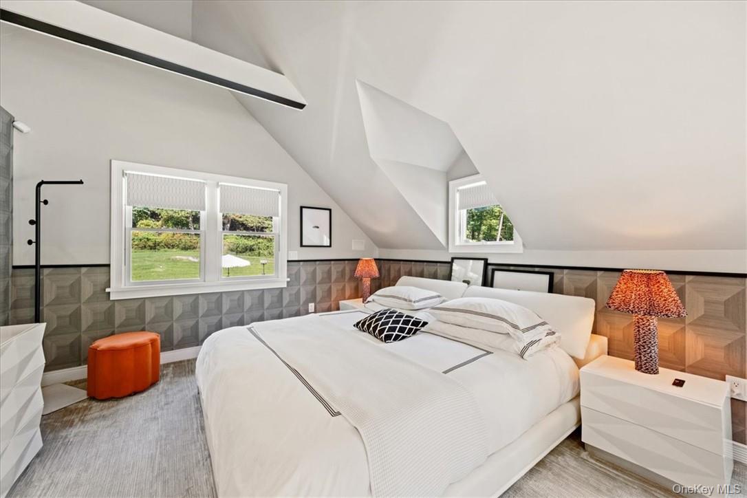 1570 Journeys End Road Croton-on-Hudson, NY 10520 - Photo 23 of 50 a bedroom with a bed and a large window
