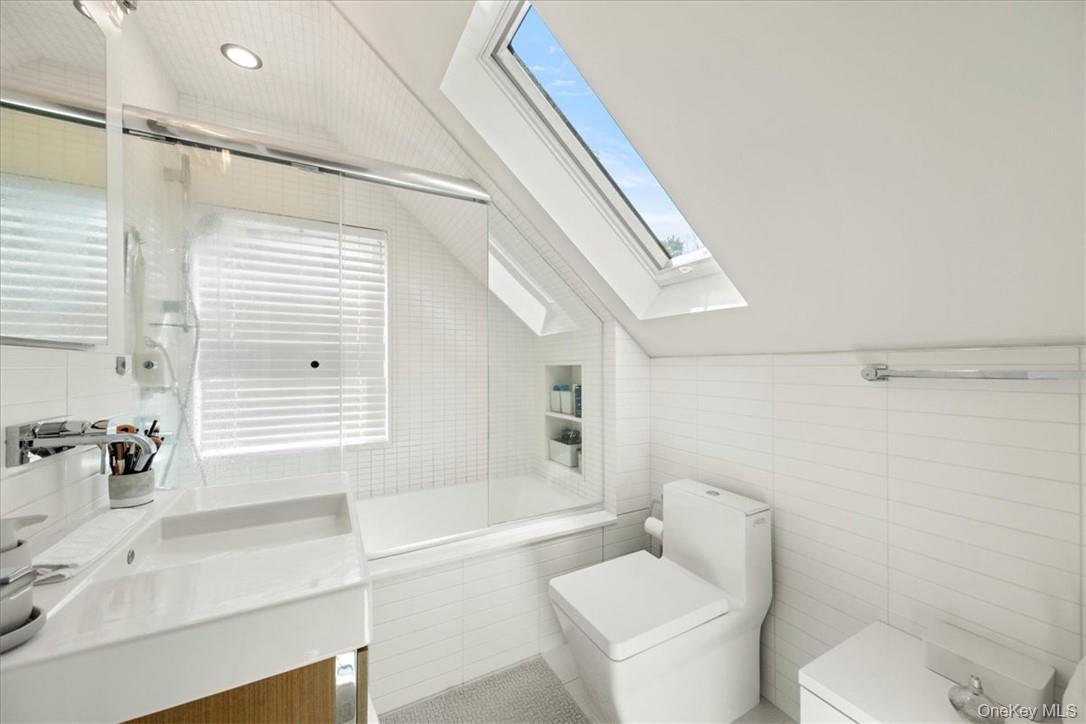 1570 Journeys End Road Croton-on-Hudson, NY 10520 - Photo 24 of 50 a bathroom with a sink a toilet and shower