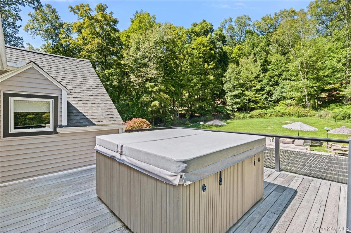 1570 Journeys End Road Croton-on-Hudson, NY 10520 - Photo 37 of 50 a view of a roof deck with wooden floor and seating space