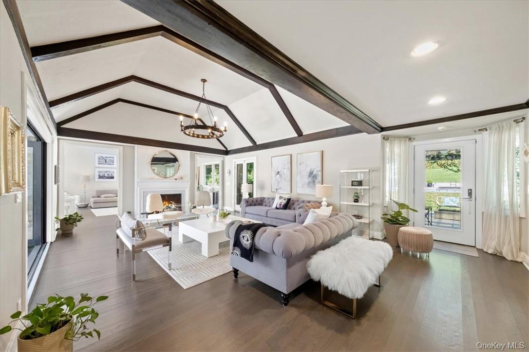 1570 Journeys End Road Croton-on-Hudson, NY 10520 - Photo 7 of 50 a living room with furniture large window and wooden floor