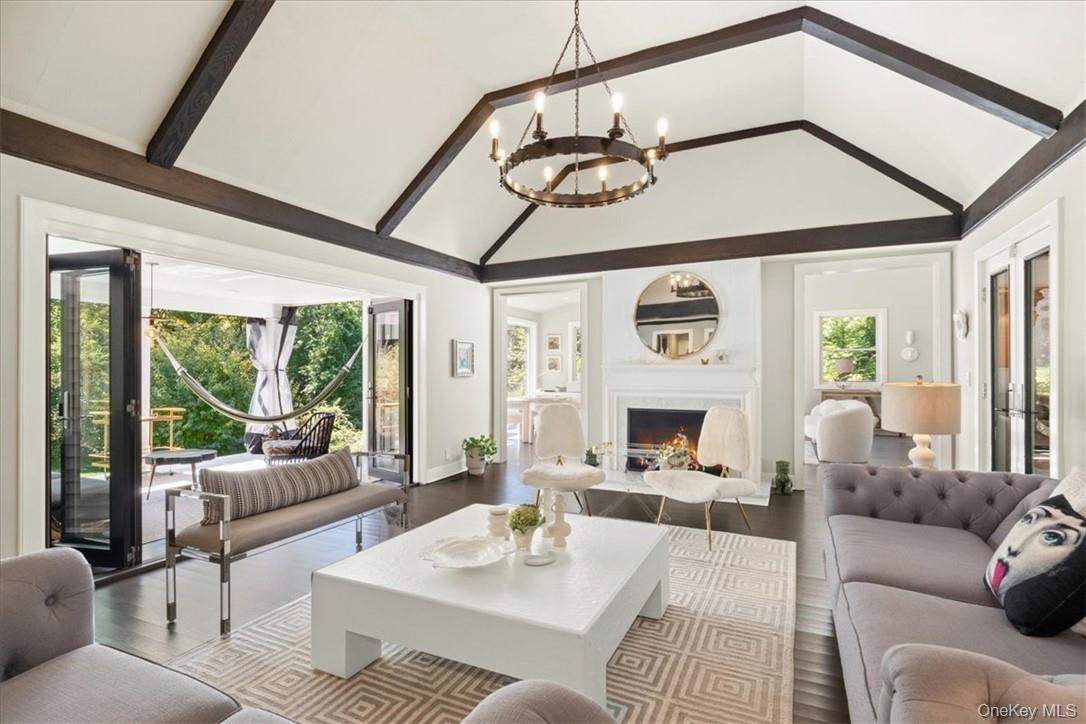 1570 Journeys End Road Croton-on-Hudson, NY 10520 - Photo 8 of 50 a living room with furniture and a large window