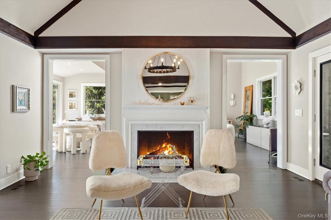 1570 Journeys End Road Croton-on-Hudson, NY 10520 - Photo 10 of 50 a living room with furniture and a fireplace