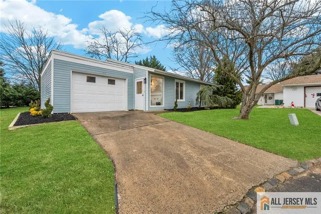 a porch with seating space and a garden