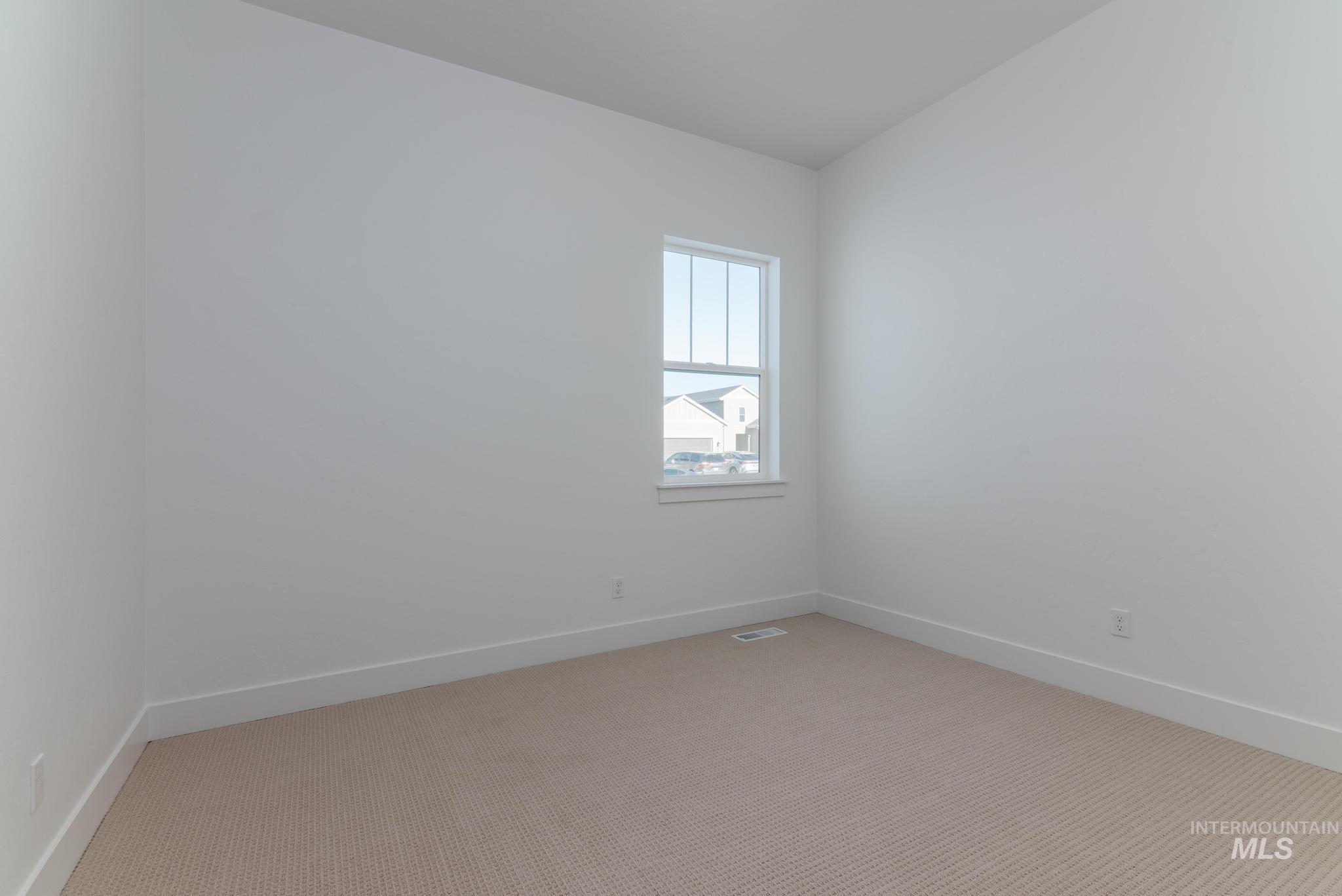 9085 West Patmore Court Star, ID 83669 - Photo 25 of 40 Unfurnished room with carpet floors and baseboards