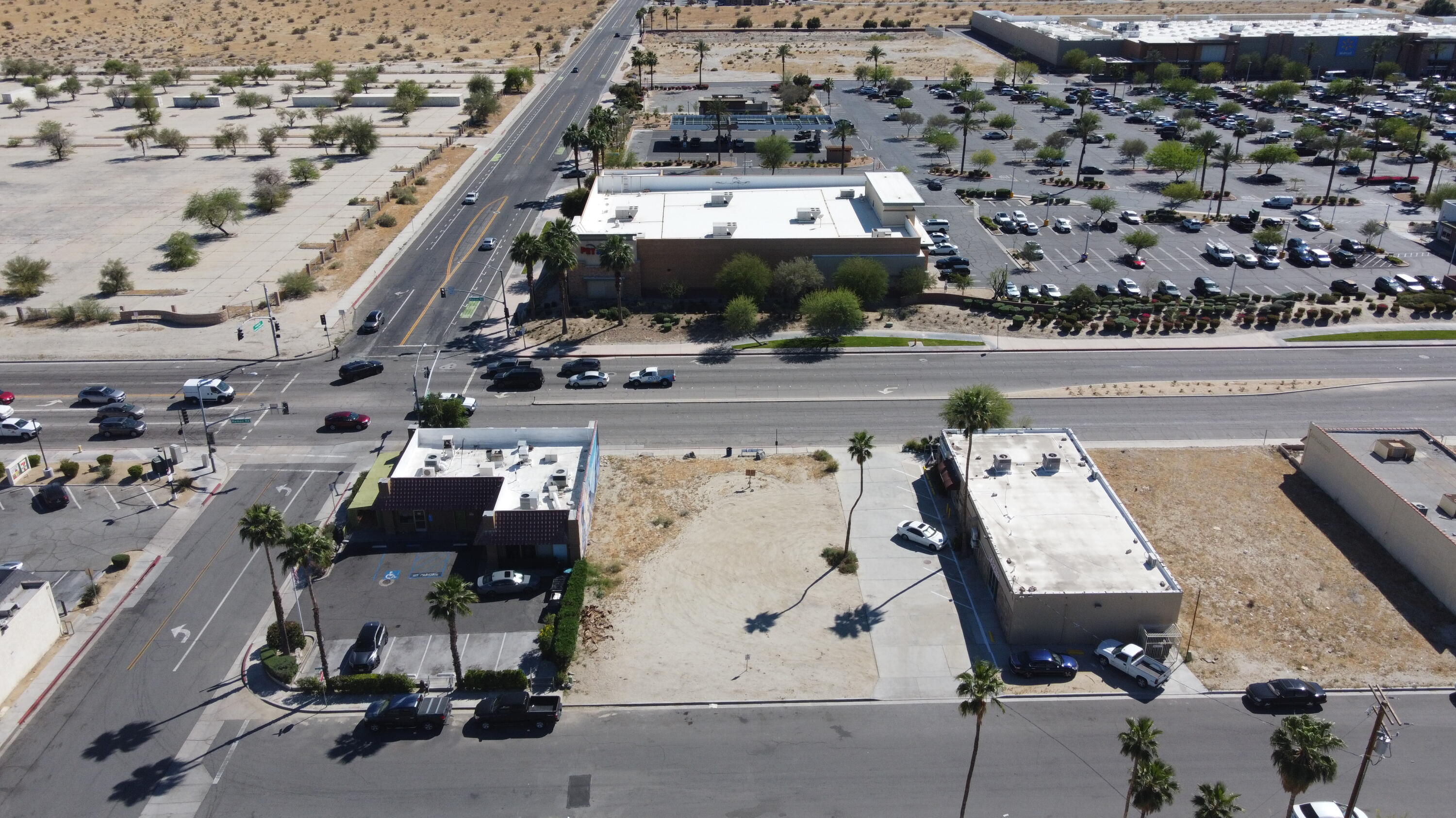 67460 Ramon Road Cathedral City, CA 92234 - Photo 2 of 11 an aerial view of a large building and front view of a building