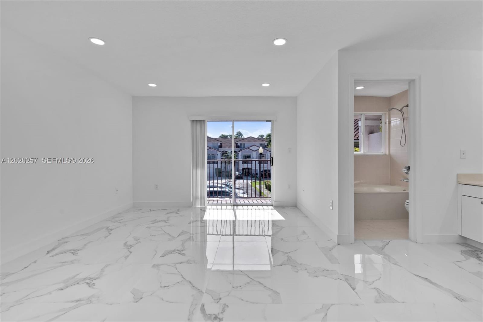 10245 Southwest 154th Place, Unit 1123 Miami, FL 33196 - Photo 27 of 38 a room with natural light and view of living room