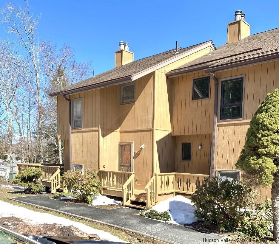 72 Hunter Ridge, Unit L1 Hunter, NY 12442 - Photo 23 of 23 a view of a house with a patio