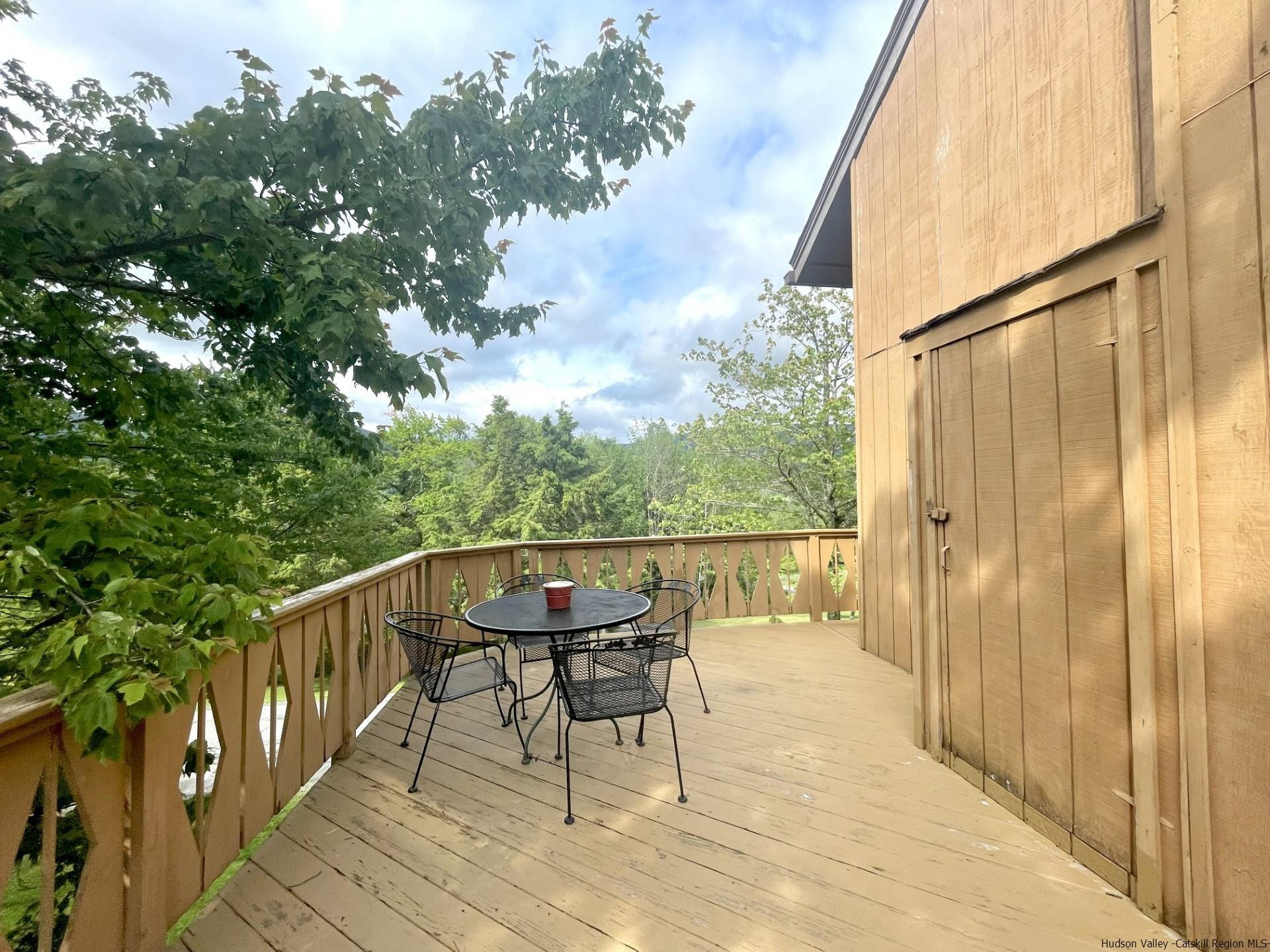 72 Hunter Ridge, Unit L1 Hunter, NY 12442 - Photo 5 of 23 a view of balcony with furniture
