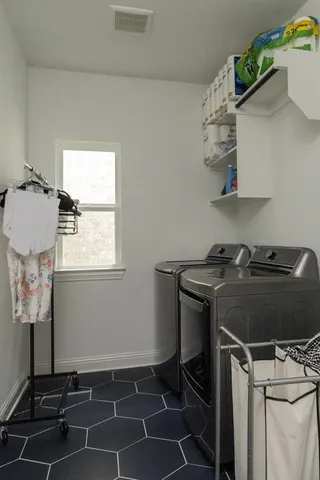 a view of a house with swimming pool and a yard