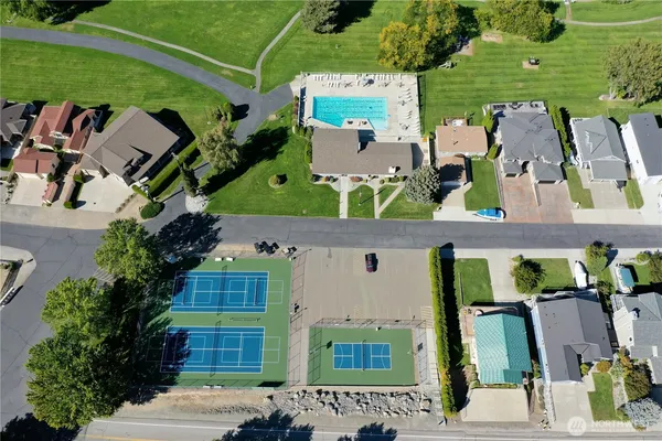 an aerial view of a house with a outdoor space