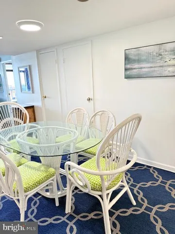 a view of a dining room with furniture wooden floor