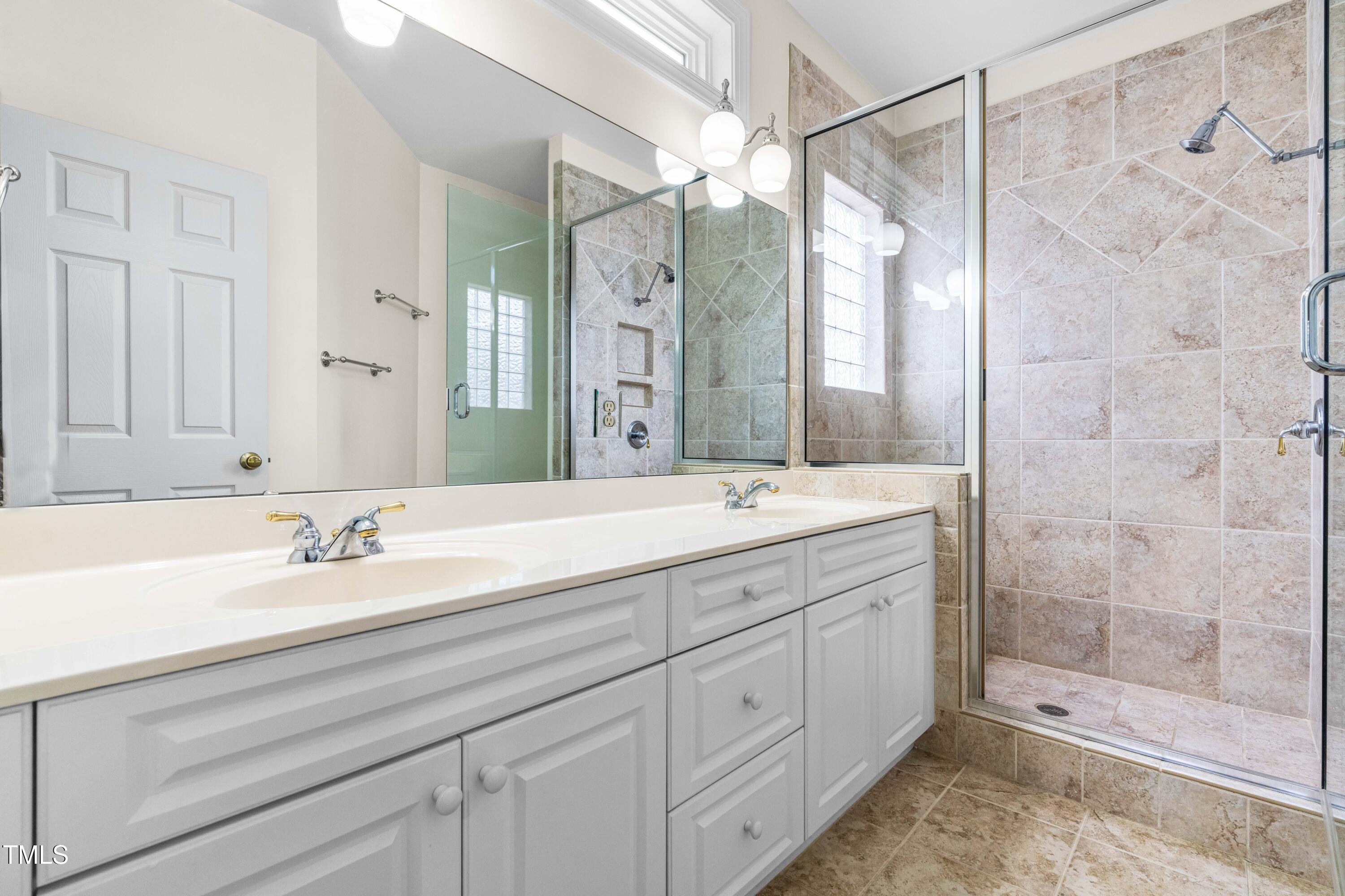 6328 Nowell Pointe Drive Raleigh, NC 27607 - Photo 26 of 56 Owners Bathroom 1