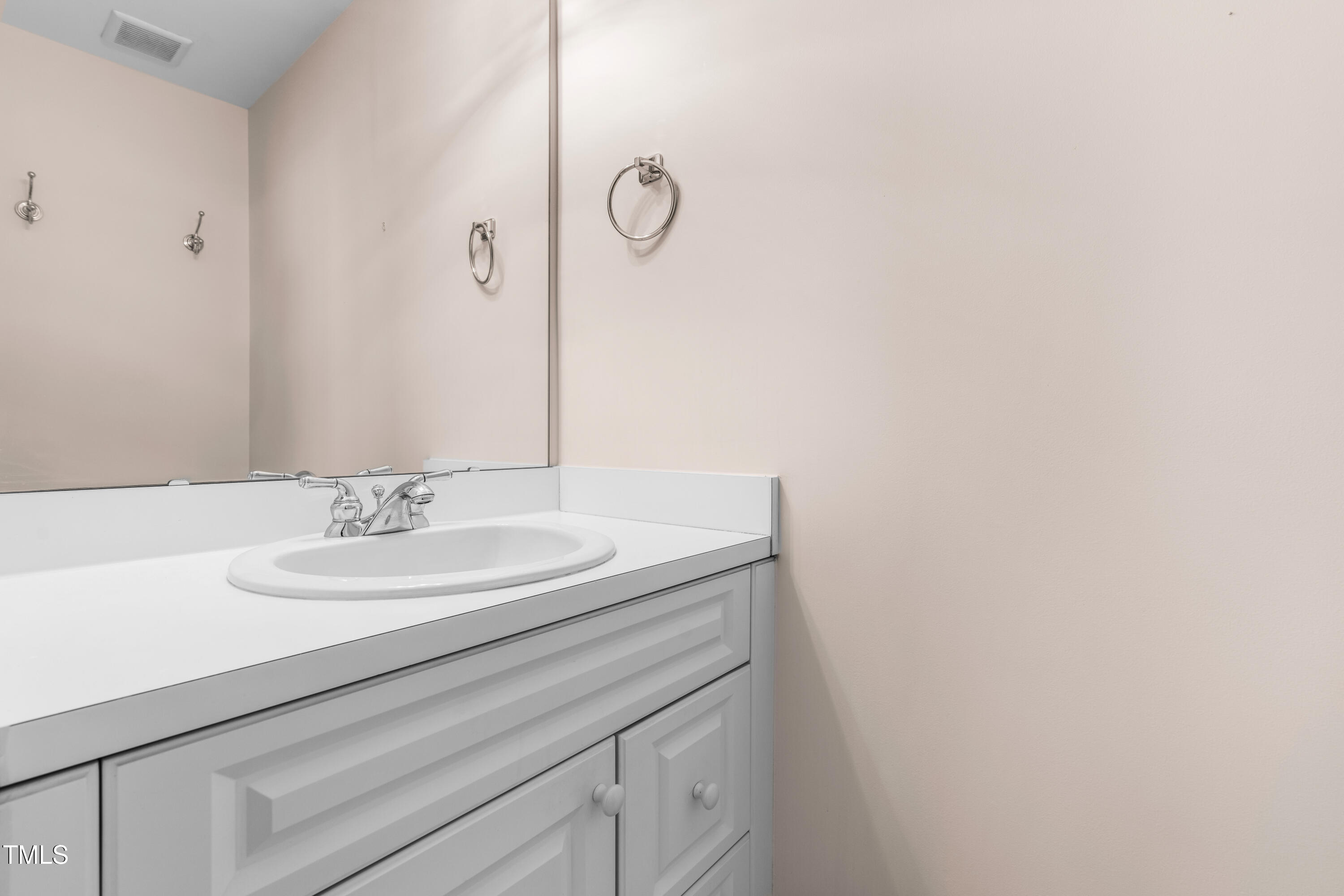 6328 Nowell Pointe Drive Raleigh, NC 27607 - Photo 35 of 56 Half Bath En Suite with Bedroom 2