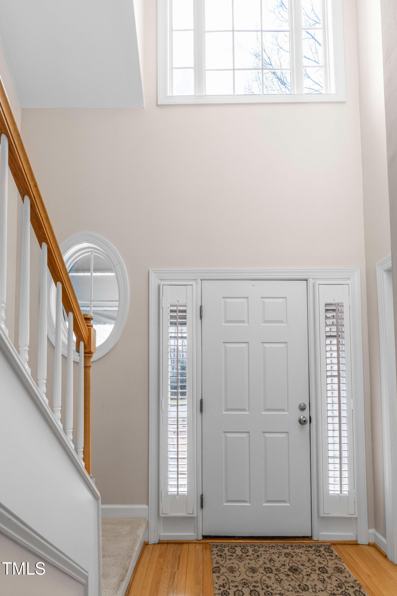 6328 Nowell Pointe Drive Raleigh, NC 27607 - Photo 5 of 56 Foyer and Front Door with Natural Light
