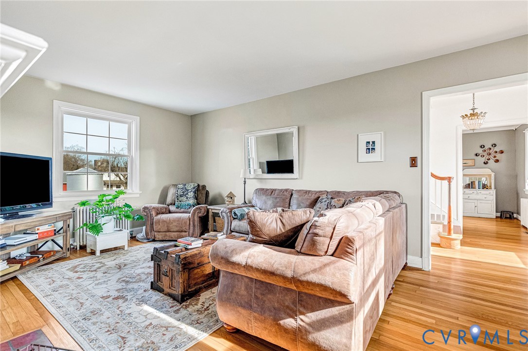 2172 Piping Tree Ferry Road Mechanicsville, VA 23111 - Photo 11 of 50 a living room with furniture and a flat screen tv