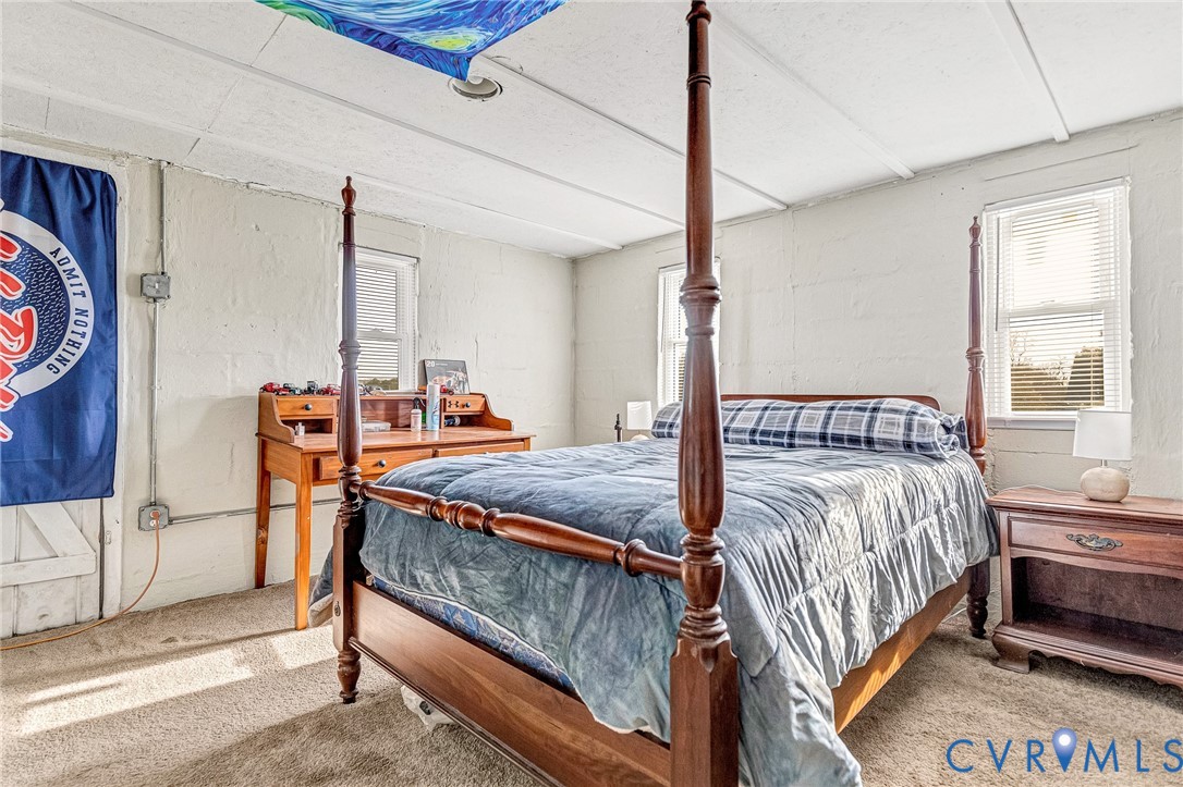 2172 Piping Tree Ferry Road Mechanicsville, VA 23111 - Photo 35 of 50 a bedroom with bed and a window