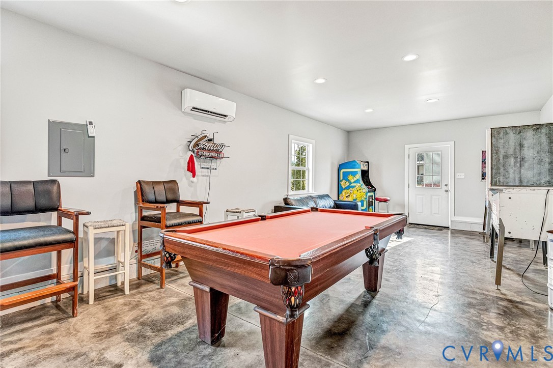 2172 Piping Tree Ferry Road Mechanicsville, VA 23111 - Photo 38 of 50 a room with a bed and a table