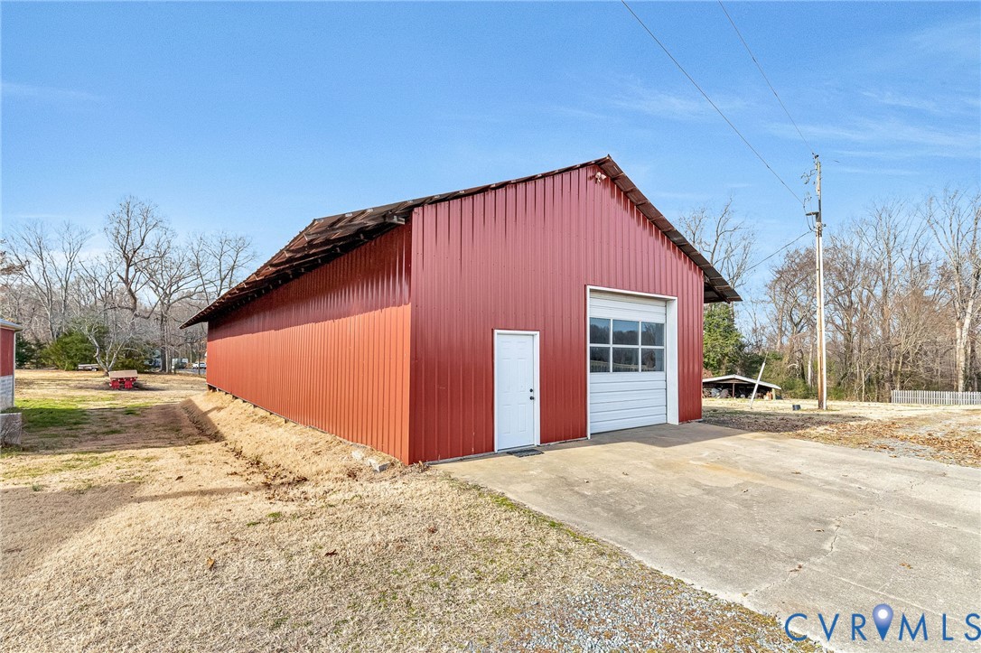 2172 Piping Tree Ferry Road Mechanicsville, VA 23111 - Photo 39 of 50 a view of a house with a yard