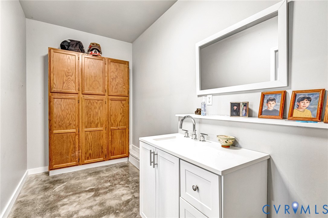 2172 Piping Tree Ferry Road Mechanicsville, VA 23111 - Photo 40 of 50 a utility room with sink dryer and washer