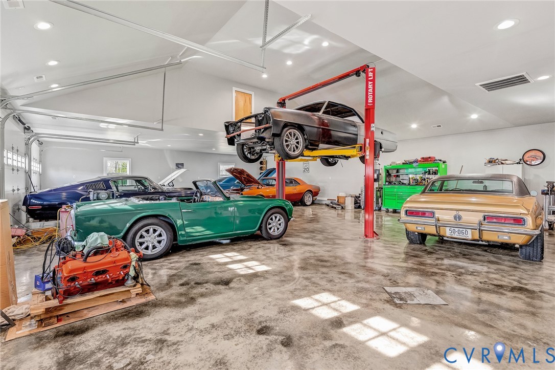 2172 Piping Tree Ferry Road Mechanicsville, VA 23111 - Photo 41 of 50 a car parked in a garage