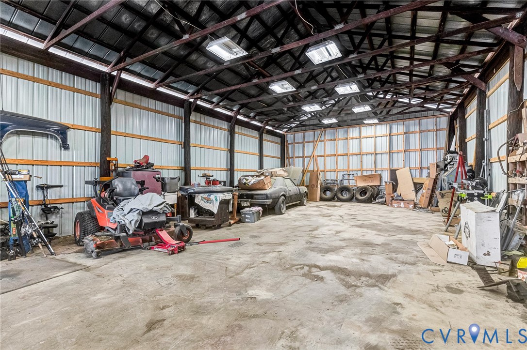 2172 Piping Tree Ferry Road Mechanicsville, VA 23111 - Photo 44 of 50 a view of a storage room with gym equipment