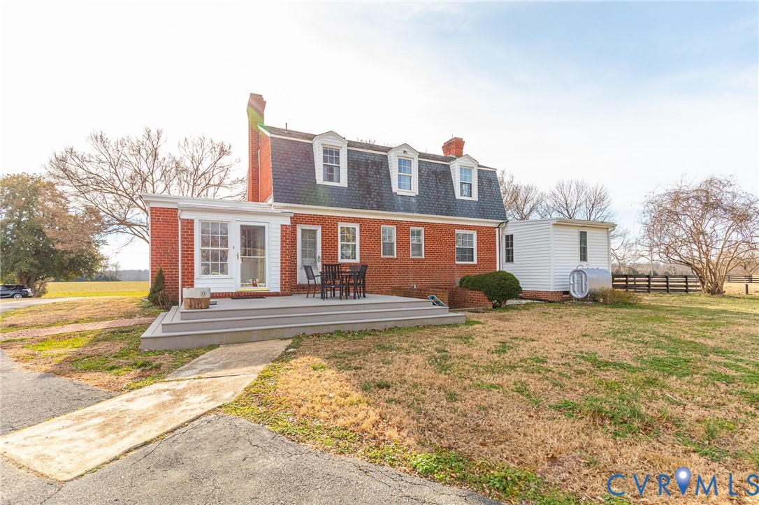 2172 Piping Tree Ferry Road Mechanicsville, VA 23111 - Photo 5 of 50 a view of a house with a swimming pool