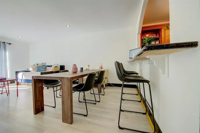 a view of a workspace with furniture