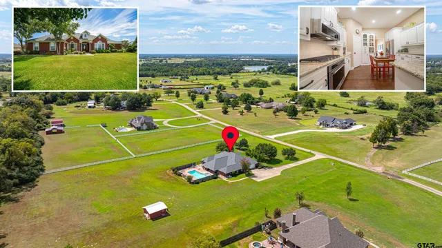 a view of a pool and a back yard
