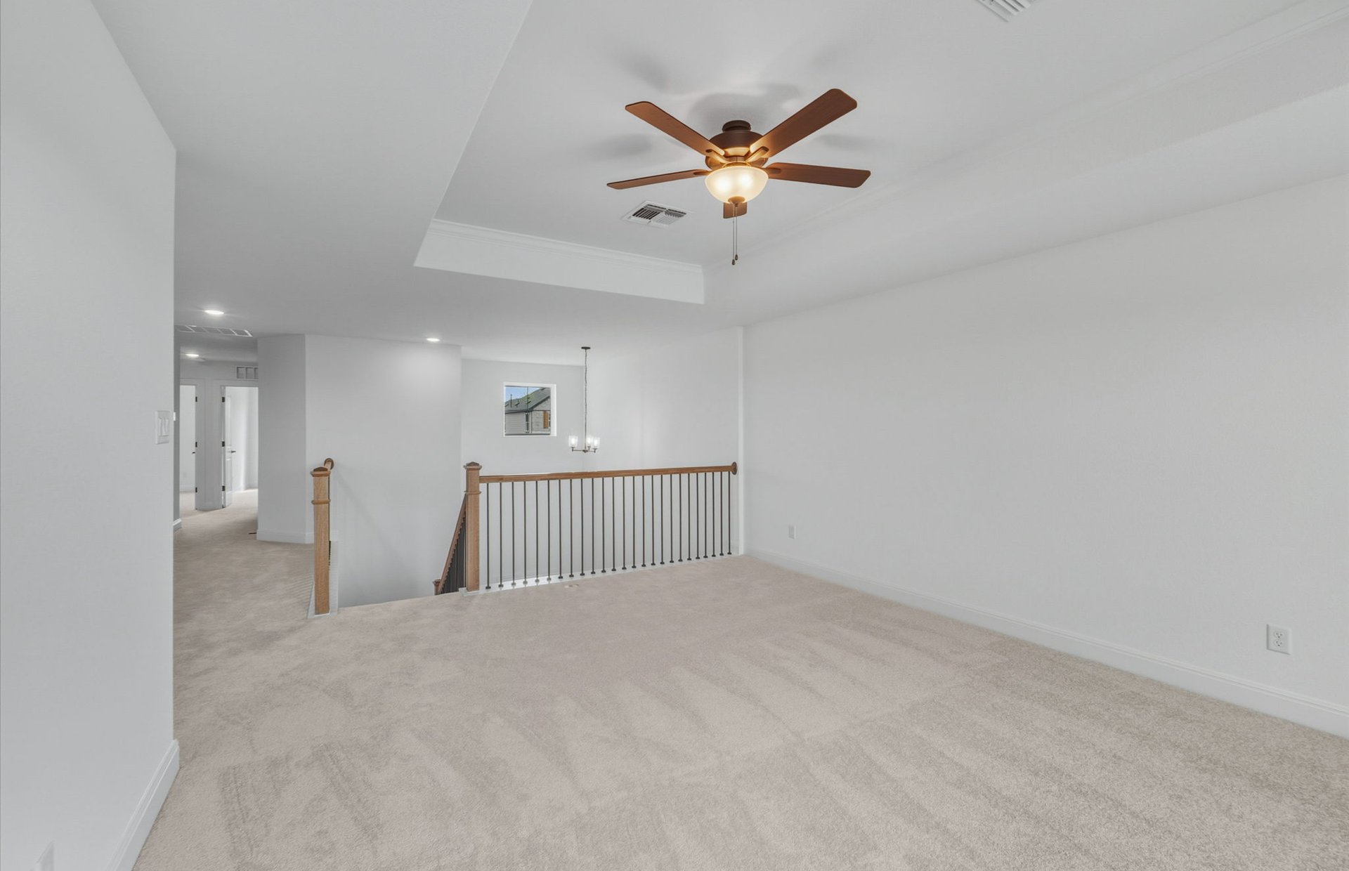 421 Foresail Road Leander, TX 78641 - Photo 18 of 28 a view of a livingroom with a ceiling fan and window
