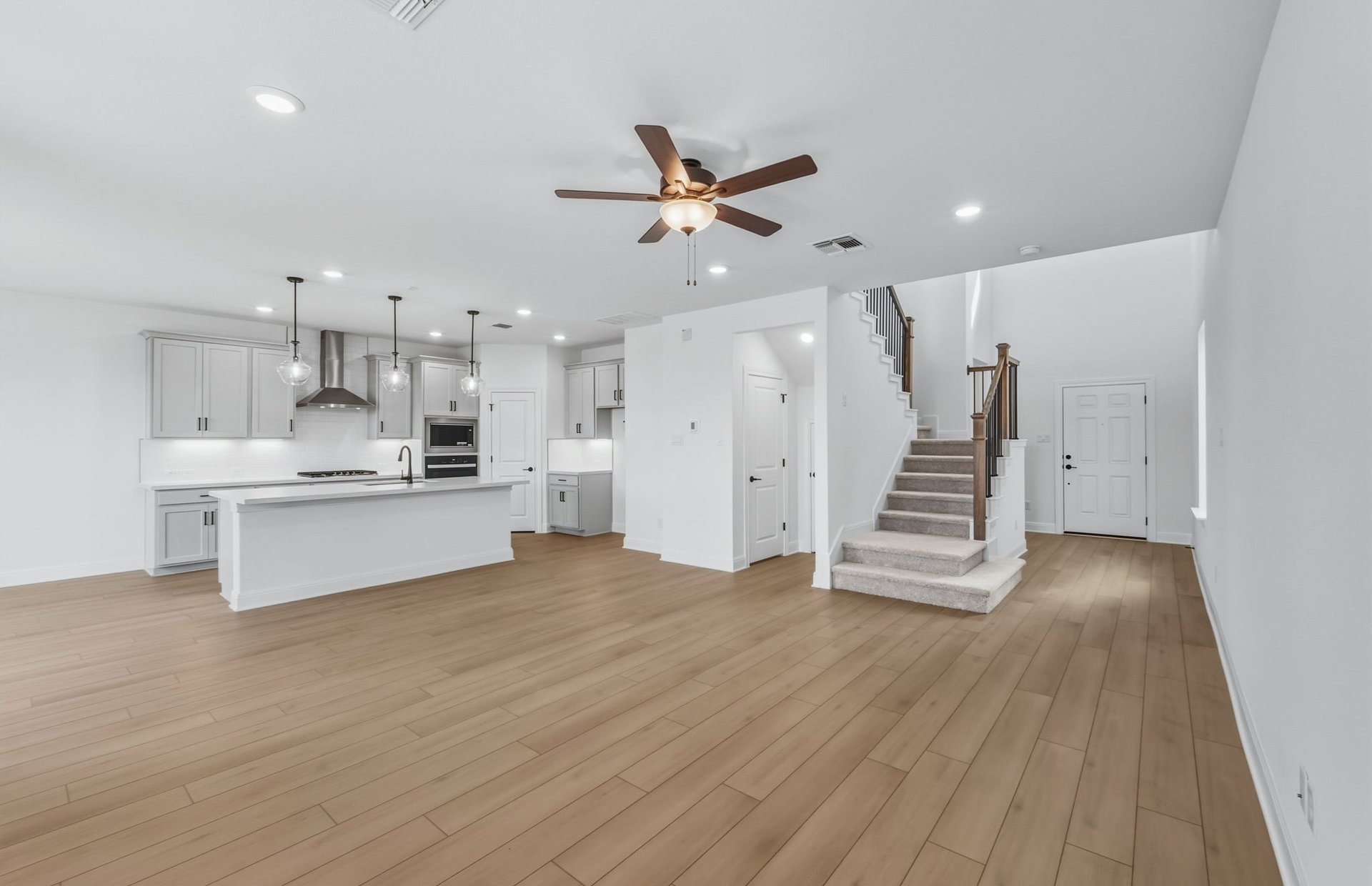 421 Foresail Road Leander, TX 78641 - Photo 7 of 28 a view of kitchen with sink and refrigerator