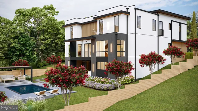 a front view of a house with a yard and a garden