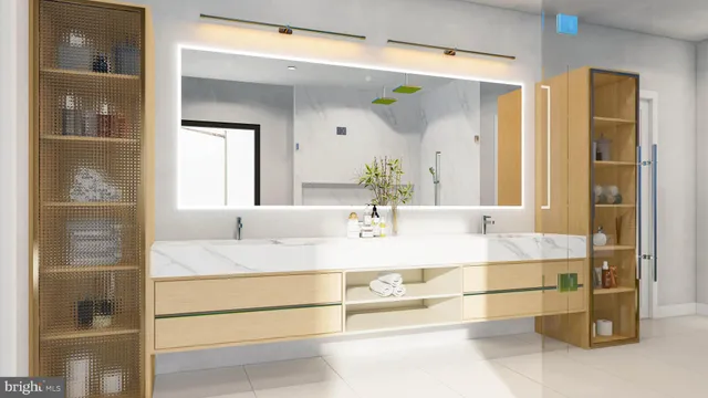 a en suite bathroom with a double vanity sink and a mirror