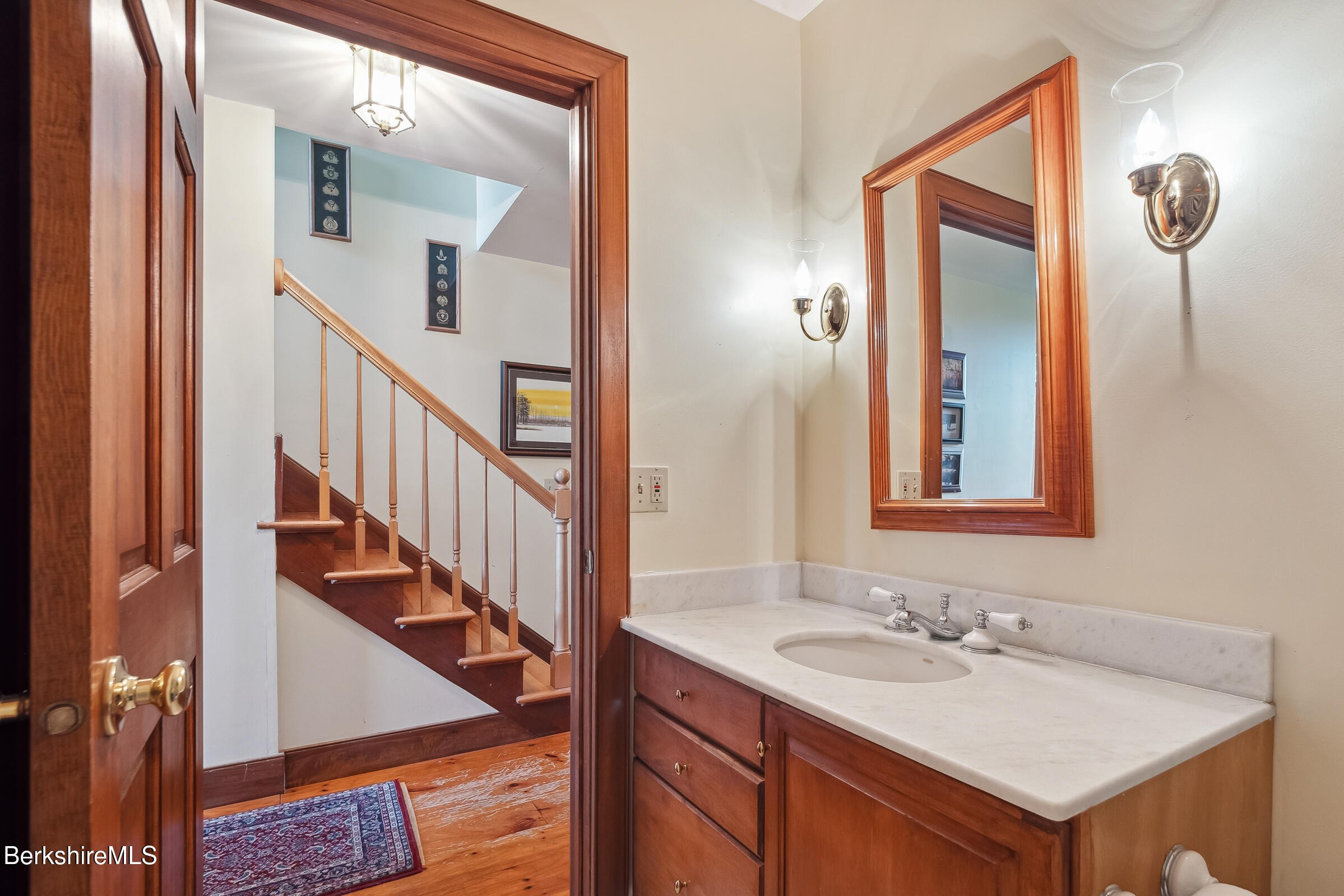 2205 County Rte 5 Canaan, NY 12029 - Photo 16 of 45 a bathroom with a sink and a mirror