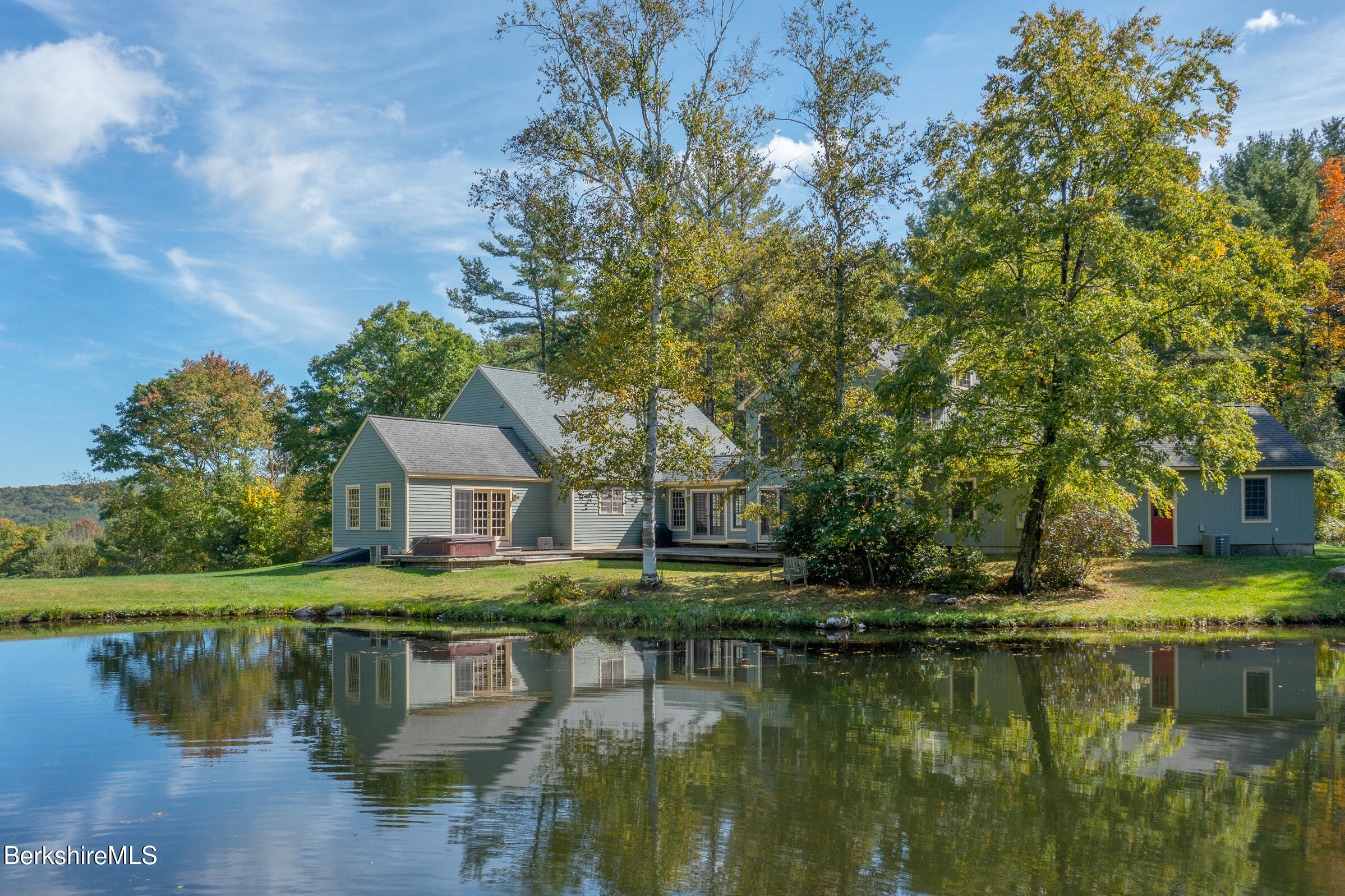 2205 County Rte 5 Canaan, NY 12029 - Photo 29 of 45 a view of a large house with a big yard and large trees