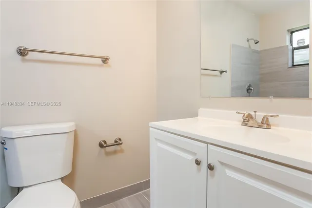 a bathroom with a sink and a toilet