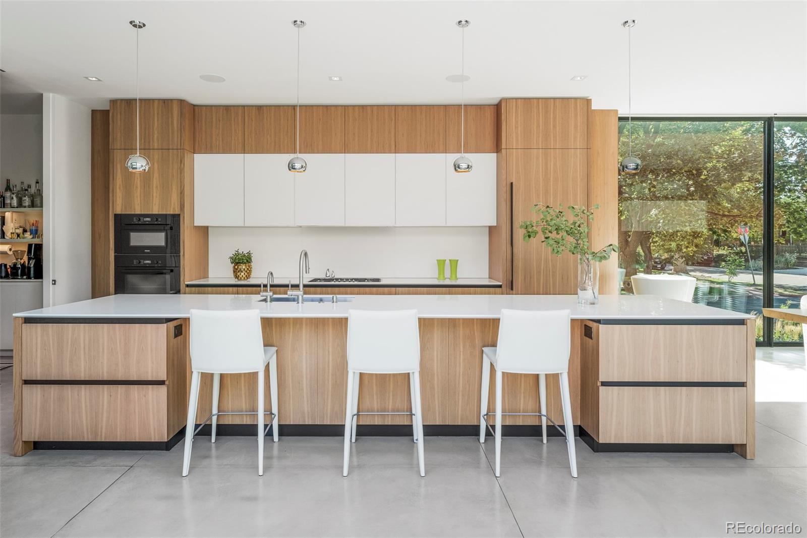4100 Bryant Street Denver, CO 80211 - Photo 10 of 30 a kitchen with table and chairs