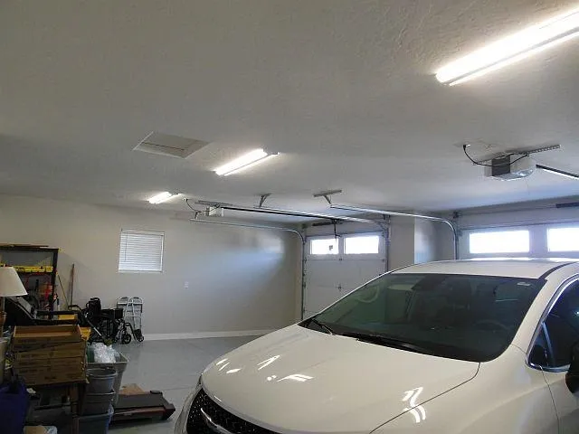 a room with a large bed and furniture