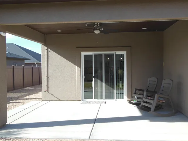a house with a bench in patio