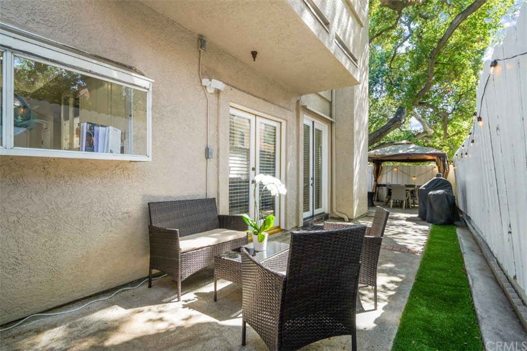 6255 Honolulu Avenue, Unit 23 Tujunga, CA 91042 - Photo 17 of 36 a balcony with furniture and a potted plant