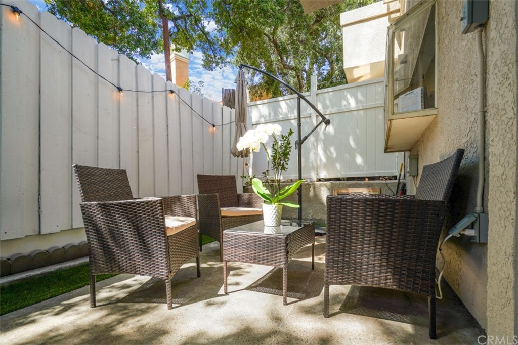 6255 Honolulu Avenue, Unit 23 Tujunga, CA 91042 - Photo 19 of 36 a view of backyard with outdoor seating and stairs