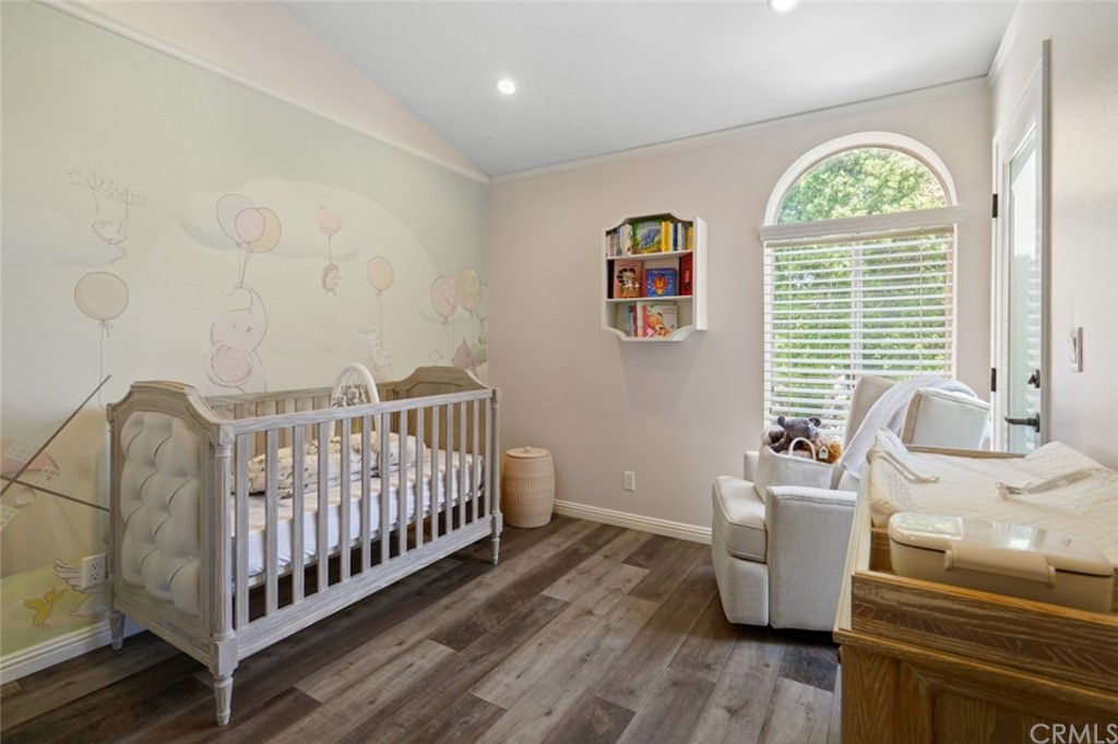 6255 Honolulu Avenue, Unit 23 Tujunga, CA 91042 - Photo 27 of 36 a bedroom with a bed and a window